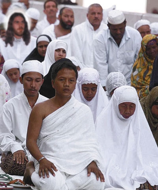 Christ (uppermost left) joins fellow Muslims in prayer.